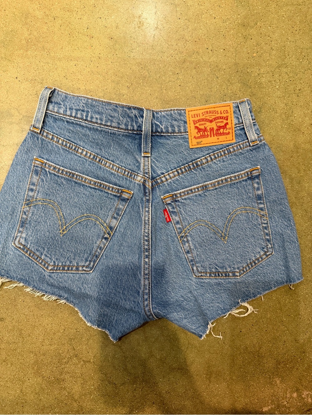 Levi's Light Blue Denim Cutoff Shorts with Leather Patch